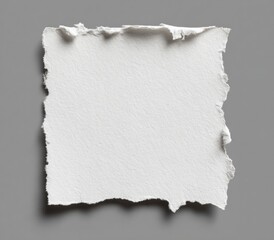 Obraz premium A roughly torn square of off-white paper with uneven edges, set against a neutral grey background, casts a subtle shadow