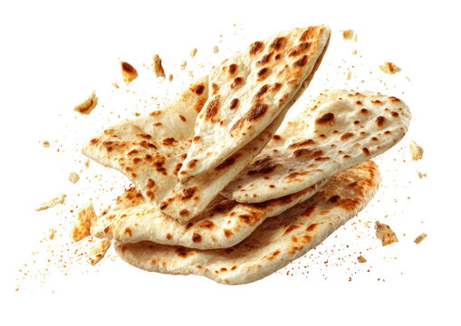 Stack of naan bread with crumbs, isolated on black