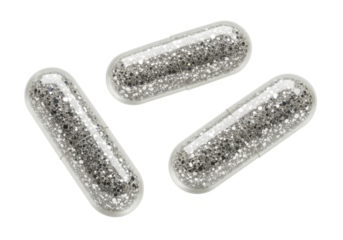 Isolated pills with glitter inside, closeup of three shimmering gel caps for design elements