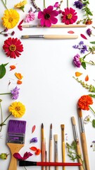 Floral frame with art brushes on a white background