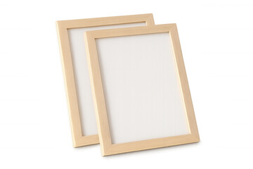 Fototapeta premium Two light wooden frames with empty white space, lying on transparent background, offering clear mockup template