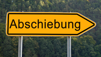 Wegweiserschild mit dem Aufdruck "Abschiebungl"