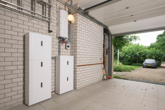 Battery storage system for renewable energy in private house garage