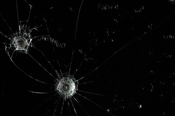 Bullet holes on black glass, overlay design background