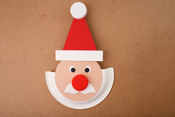 Playful children craft face made from everyday objects, perfect for educational publishers, toy...