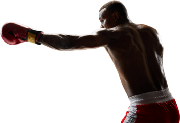 Male boxer extending arm forward showing powerful punch and perfect motion. Concept of speed, precision, athletic performance, and physical control. Transparent background