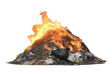 Inferno ablaze atop refuse mountain, a powerful symbol of wastefulness, fire danger