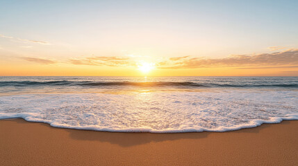 Fototapeta premium Golden sunrise over calm sea with gentle waves reflecting light, creating serene atmosphere