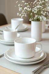 Fototapeta premium Minimalist ceramic cup on plate, neat table setting with flowers, soft light and neutral tones, expressing clean design, elegant dining, morning coffee, cozy ambience, calm lifestyle.