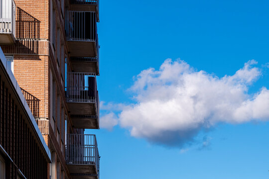 Apartment building with balconies and glass railings in the district of Stora Ursvik Stockholm Sweden showing sustainable urban design