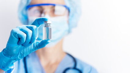 Healthcare Professional Holding a Vaccine Vial