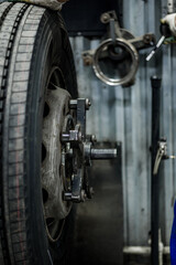 Fototapeta premium the process of repairing and balancing car tires