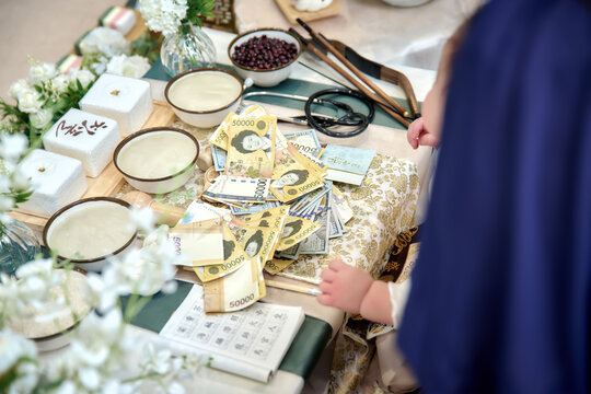 Beautiful Korean doljanchi gift table with traditional envelopes, decorations, and elegant accessories. A luxurious setup celebrating a baby&rsquo;s first birthday in Korean style