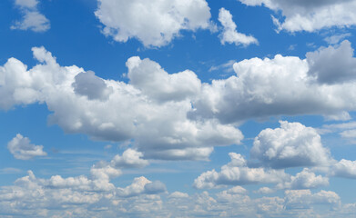 A beautiful blue sky with soft white clouds for abstract background