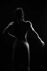 Naklejka premium Bodybuilder lifestyle gym stretching workout pose strong female back muscle silhouette fitness