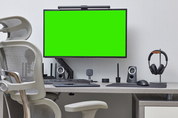 modern comfortable workspace for remote work. empty green computer pc and setup for freelancer from home office