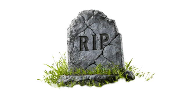 Ancient cracked tombstone with rip carved surrounded by grass