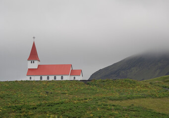 Reyniskirkja Church in mountains in Iceland © wlad074