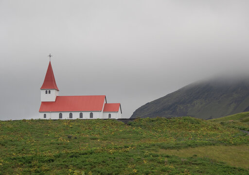 Reyniskirkja Church in mountains in Iceland