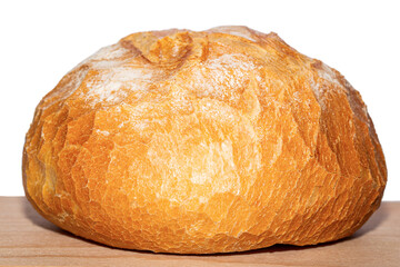 Freshly baked bread on wooden cutting board isolated on white background. Bread loaf is displayed on a wooden cutting board, fresh, homemade appearance