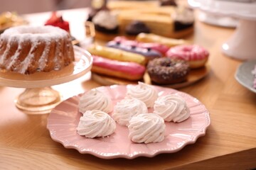 Buffet menu. Different delicious desserts on table, selective focus