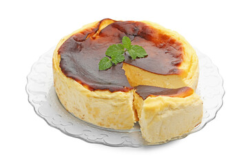 Delicious Basque cheesecake with mint isolated on white