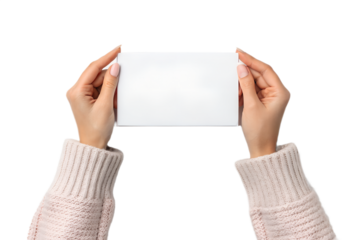 Female hands in a cozy sweater holding a blank white horizontal card or sign, isolated on a transparent PNG background. Perfect mockup for inserting custom text, branding, invitations, announcements, 