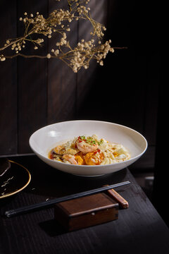 Fried eggs,White tableware for Chinese food in a Chinese restaurant, simple composition with floral background