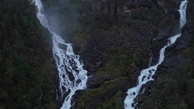 Latefossen Waterfall dropping through mountain terrain in Norway