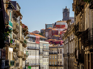 Small paved alleyway on a slope in the Ribeira district of Porto