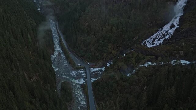 Drone shot of mountain waterfall Latefossen in rugged Norway terrain