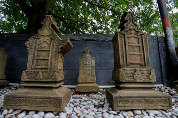 Obraz premium Ancient Acehnese Tombstones at Pedir Museum, Banda Aceh – Historical Islamic Gravestones