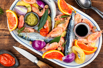 Fresh seafood and marinade.