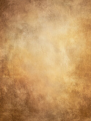 Fototapeta premium Vintage textured golden brown background with a soft gradient and distressed grunge effect. This abstract backdrop is ideal for retro designs, product photography, branding mockups, and artistic pr