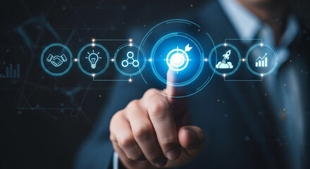 Obraz premium Driven professional achieves business goals by strategically selecting success milestones on a digital interface, visualizing growth and innovation