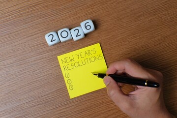 Top view image of yellow paper with the words 