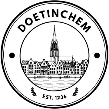 Doetinchem Emblem Featuring Church Steeple and Traditional Buildings