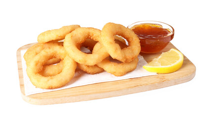 Tasty fried squid rings, lemon and sauce isolated on white