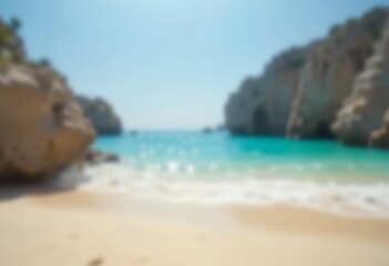sunlit coastal beach with turquoise water framed by rocky cliffs under clear blue sky