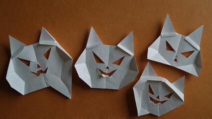 Happy Halloween pumpkin face paper cut origami