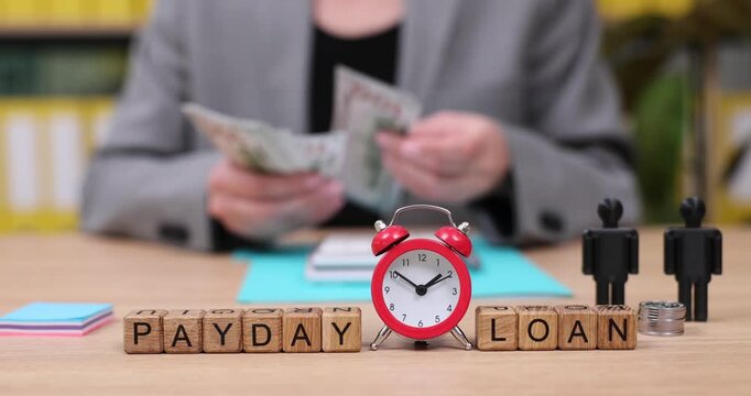Managing finances at home while counting cash and considering payday loans during the busy afternoon hours