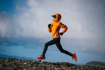 Woman runner running at the winter high altitude lakeside, Tibet