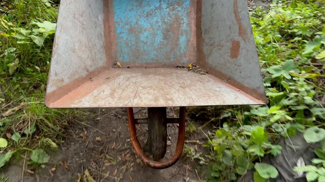 wheelbarrows are pulling along the path