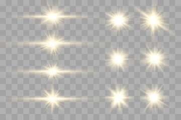 Golden glowing light streams across a transparent canvas. Sparkles drift gracefully in all directions. Ideal for elegant, magical, or festive artwork. © Extrastock