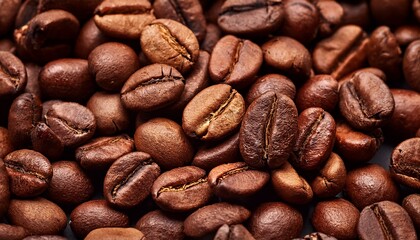 Naklejka premium Close Up Of Roasted Coffee Beans Background