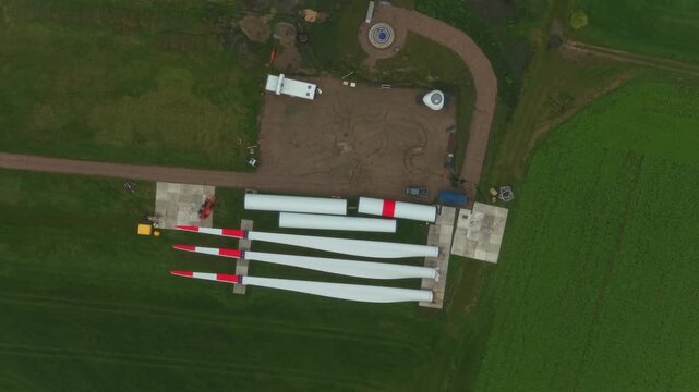 Wind tower components being installed, aerial view from above