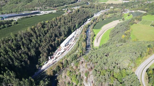 Ponte Riga near Varna and the A22, with the famous Brenner Base Tunnel construction site in the background, merging engineering and Alpine scenery.