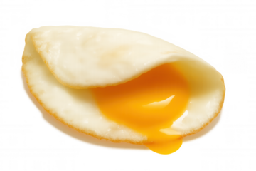 Fried egg with bright runny yolk spilling, healthy breakfast food element, cut out on transparent background