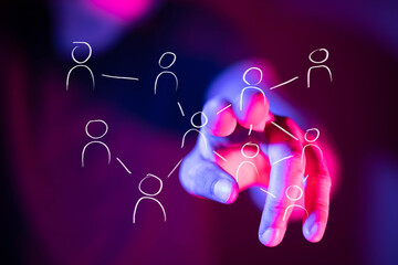 Abstract digital representation of a social network or business connection, with a human hand...