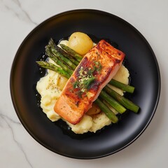 salmon with a crew neck sweater on top, served with creamy potatoes and asparagus on an elegant black plate against a clean white marble background